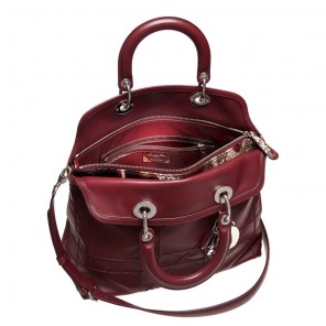 Vine-coloured leather and python-skin 