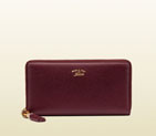 Gucci bamboo tassel leather zip around wallet 307984