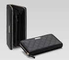 zip around wallet with gucci trademark engraved me 112724 A0V1G 1000