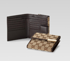 flap french wallet with gucci trademark engraved metal plate
