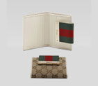 mini wallet with engraved gucci script logo. 181670 F4FOG 8420