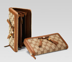 zip around wallet with woven leather bow, bamboo detail and tassels 269991 FWCGG 8526